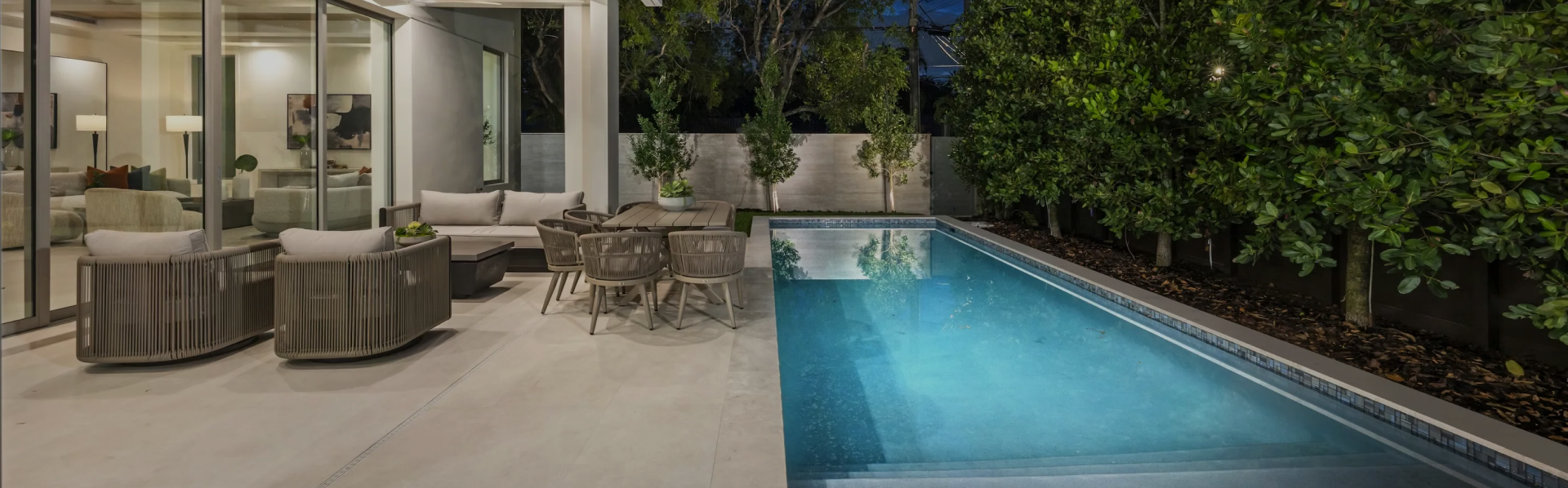 Modern home with a landscaped heated swimming pool