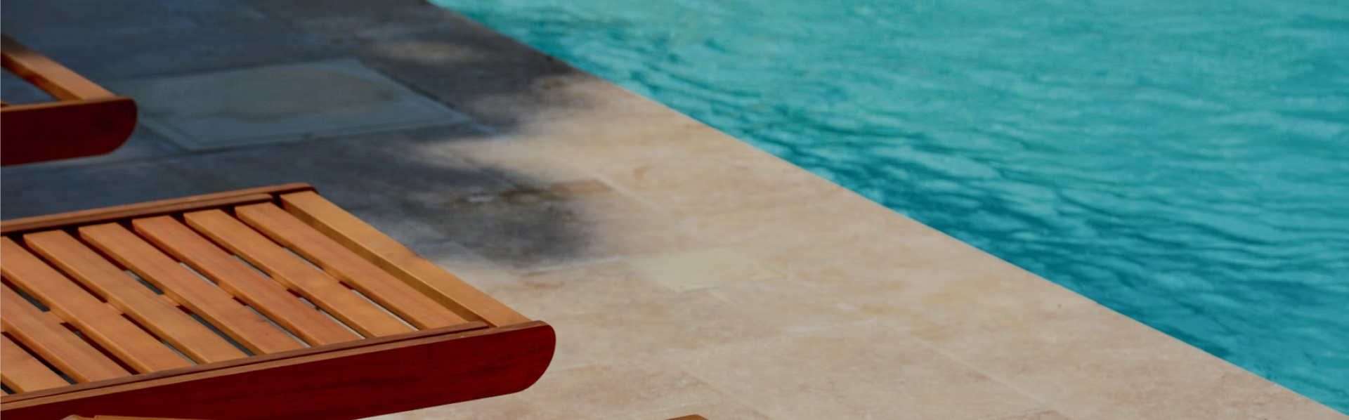 Timber deck beside a heated swimming pool